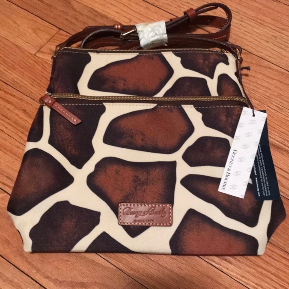 Brand new Giraffe print Dooney and Bourke